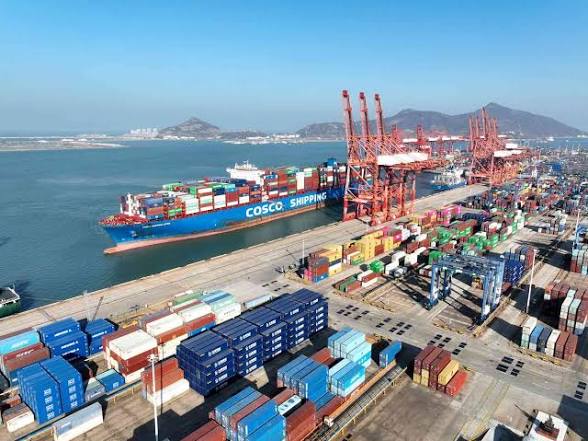 Port overview with container ships and cargo